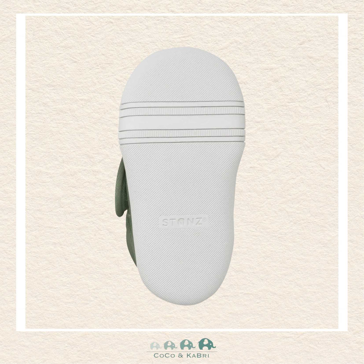 Light Gray sole on a Green Shoe