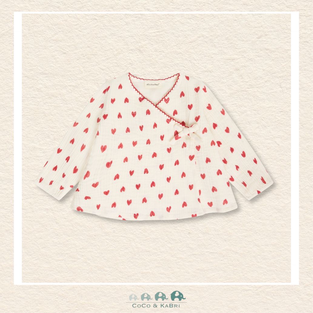 Front view of the Minymo Baby Girl Heart Blouse featuring a charming repeating heart print and a classic, lightweight 100% woven cotton construction