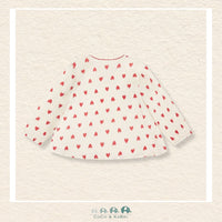 Back view of the baby girl blouse showing the clean hemline and the durable stitching designed for active little ones