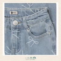 Close-up detail of the Daily7 Jeans highlighting the intricate bow accents and the authentic denim texture
