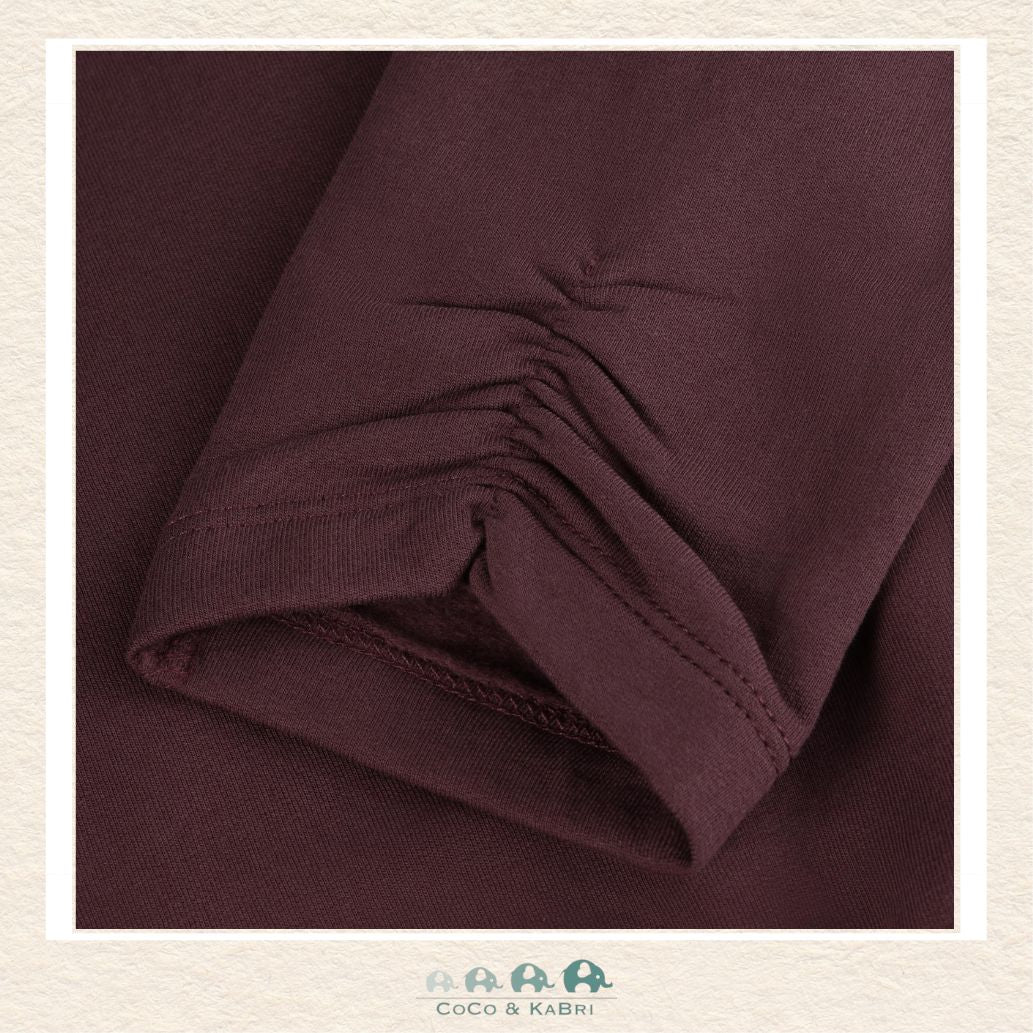 Close-up detail of the Minymo Sweat Leggings highlighting the soft-touch knit texture and the durable, flexible stitching at the hem