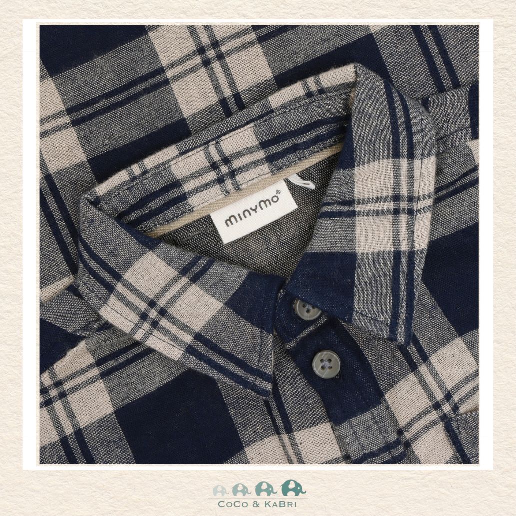 Close-up detail of the Minymo Dark Sapphire shirt highlighting the premium 100% cotton knit weave and the clean, precise lines of the checkered print