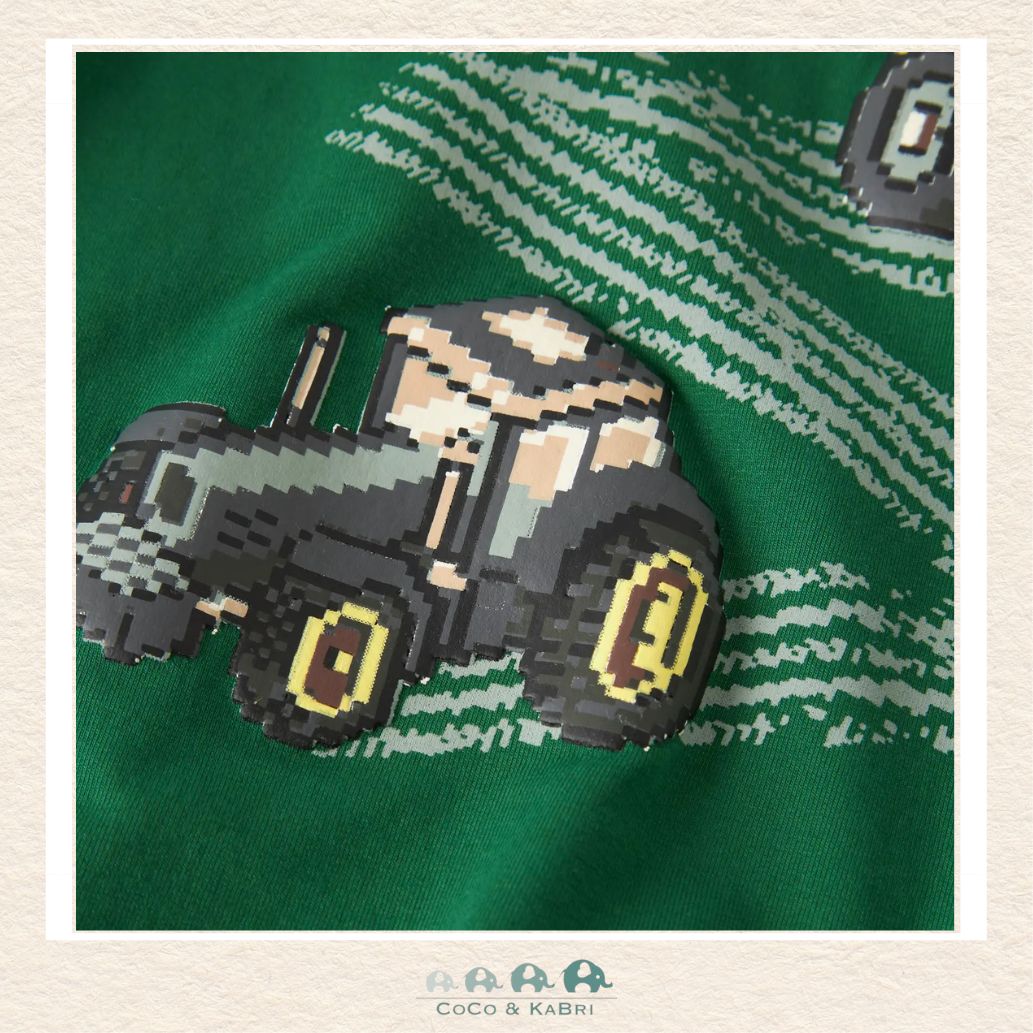 Detailed close-up of the tractor graphic and fabric highlighting the rich green hue and the high-quality, soft-touch knit texture