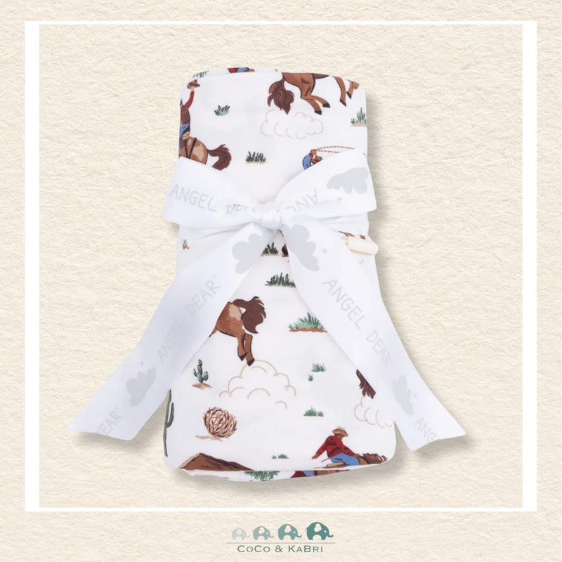 Angel Dear Buckaroo Western swaddle blanket rolled and tied with a boutique ribbon for a spirited cowboy-themed gift presentation | Canada