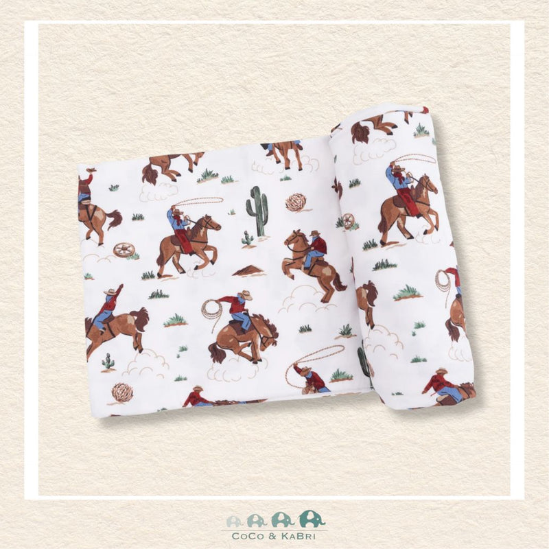 Angel Dear Buckaroo Western swaddle blanket rolled out showing the generous size and hand-drawn western icons on soft, breathable bamboo | Canada