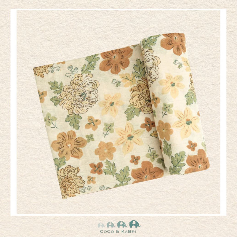 Angel Dear Chrysanthemum swaddle blanket rolled out showing the generous size and intricate hand-drawn botanical artwork on soft bamboo | Canada