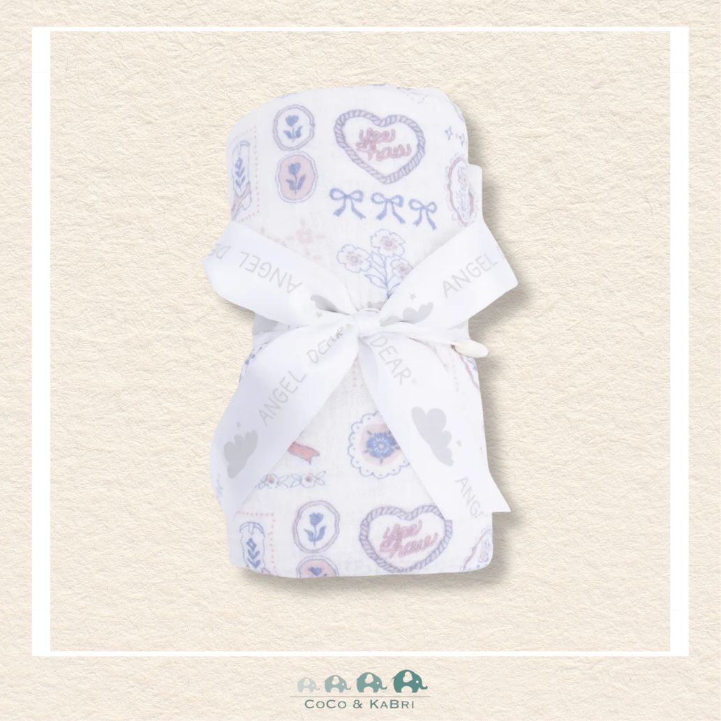 Angel Dear Country Western Heirlooms swaddle blanket rolled and tied with a boutique ribbon for a nostalgic ranch-themed gift presentation | Canada