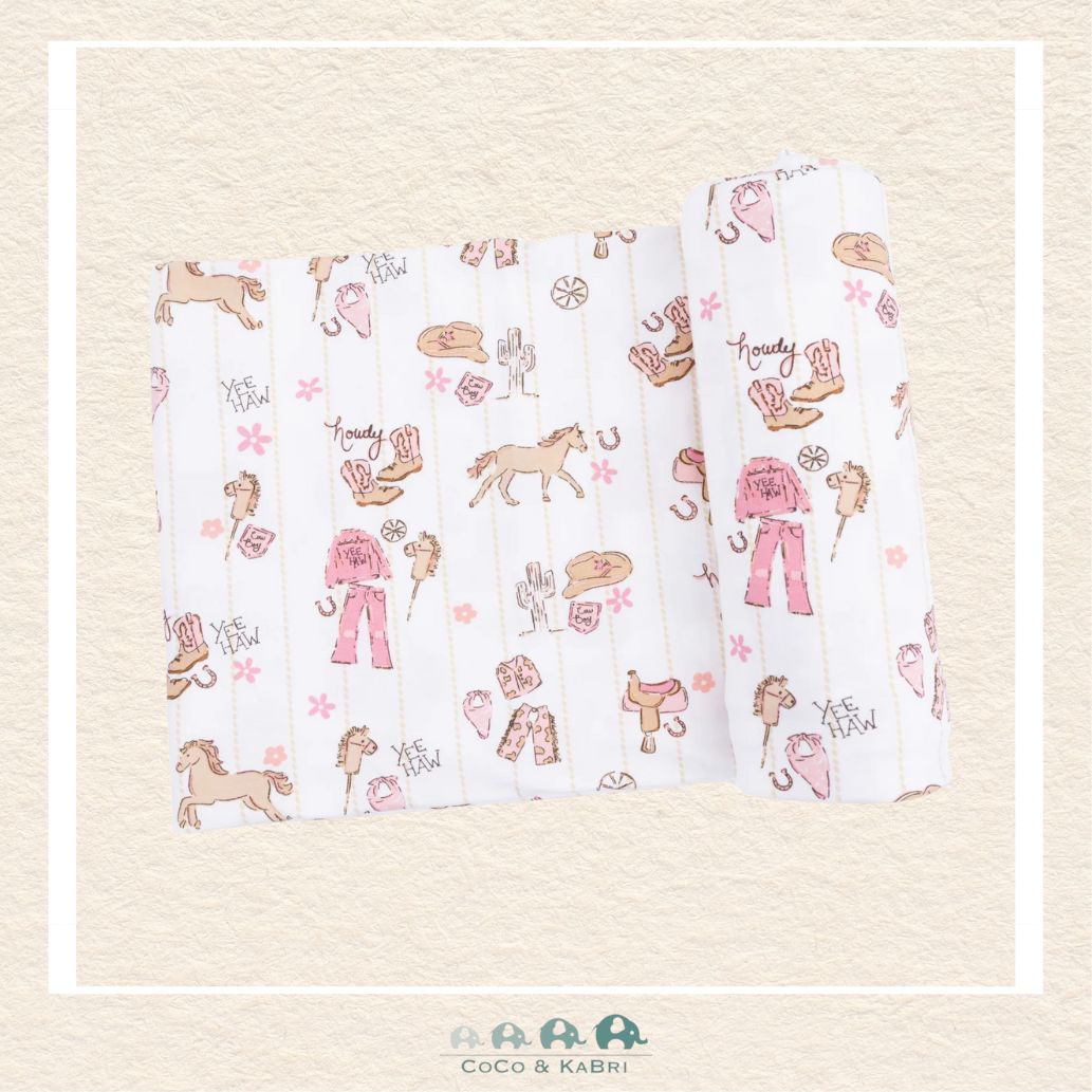 Angel Dear Cowgirl Nursery swaddle blanket rolled out showing the generous size and whimsical hand-drawn ranch life illustrations on soft bamboo | Canada