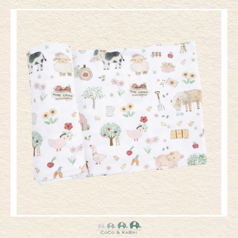 Angel Dear Cute Farm Animals Uni swaddle blanket rolled out showing the generous size and whimsical hand-drawn farm animal illustrations on soft ivory bamboo | Canada