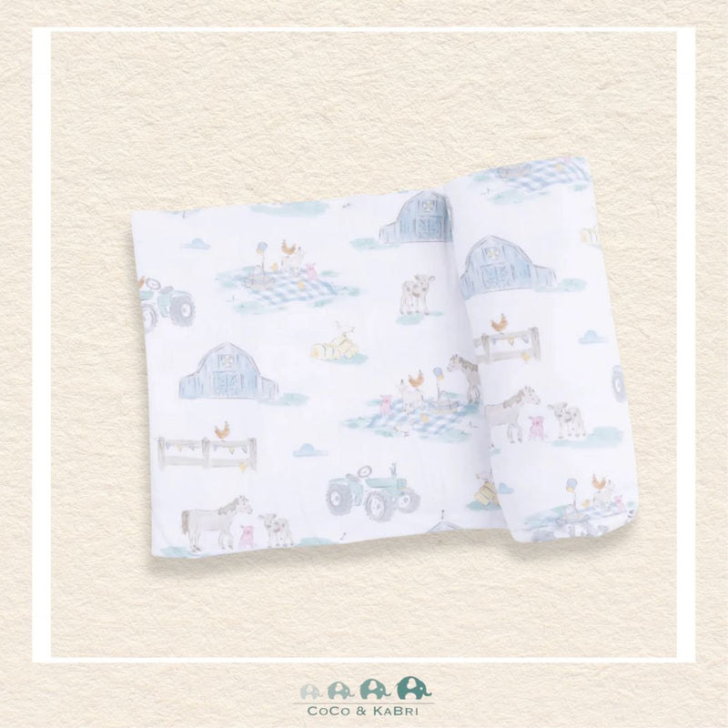 Angel Dear Farm Animal Party swaddle blanket rolled out showing the generous size and whimsical hand-drawn farm animal illustrations on soft bamboo | Canada