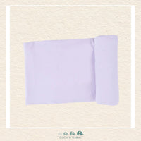 Solid Orchid Petal swaddle blanket rolled out showing the generous size and soft, muted purple-pink bamboo viscose fabric | Canada
