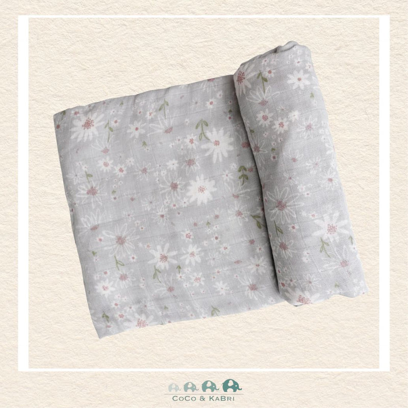 Angel Dear Sweet Daisies swaddle blanket rolled out showing the generous size and soft hand-drawn daisy illustrations on breathable bamboo | Canada