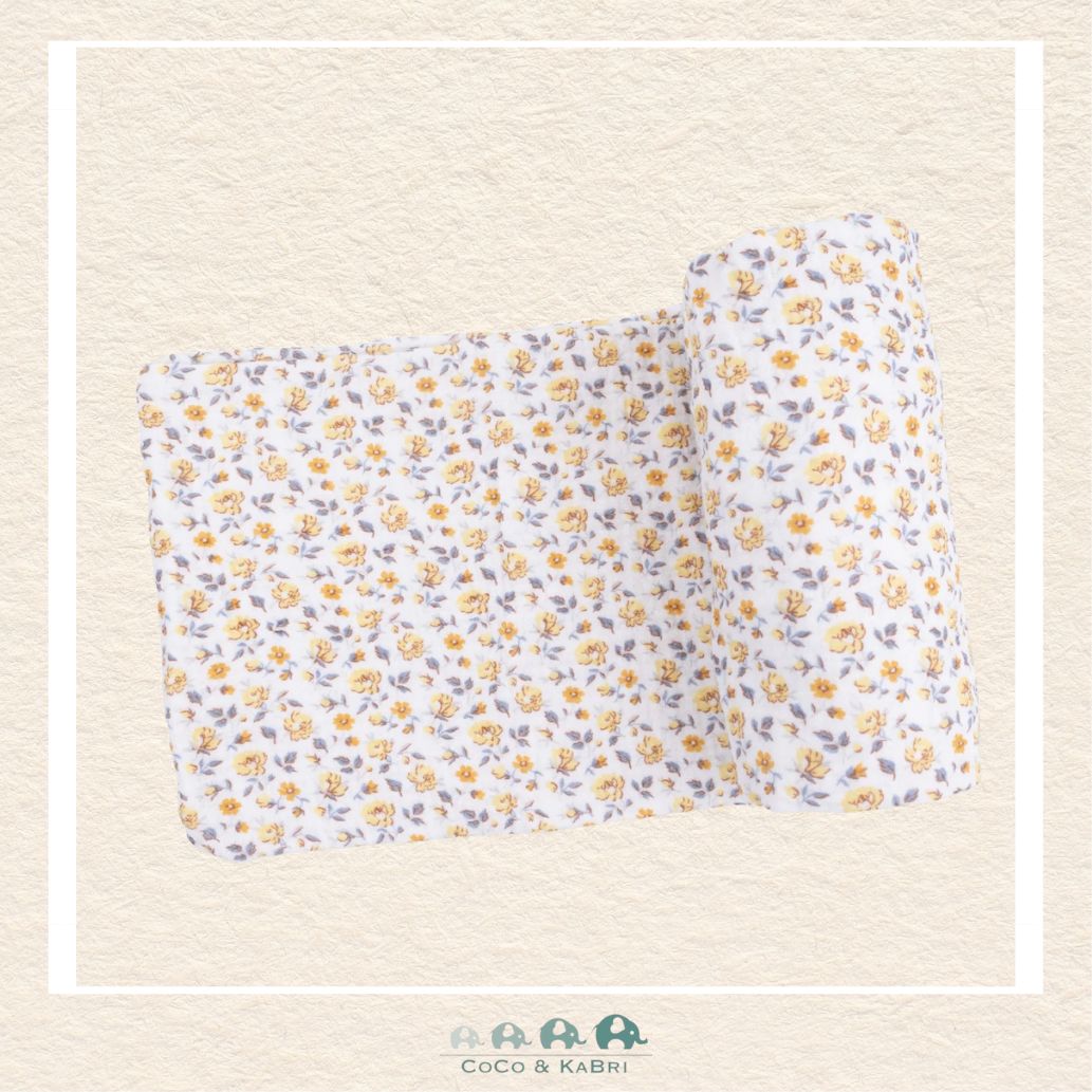 Angel Dear Yellow Country Roses swaddle blanket rolled out showing the generous size and vibrant hand-drawn yellow rose illustrations on soft bamboo | Canada