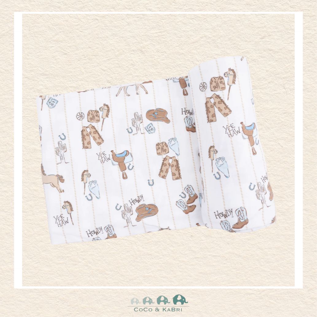 Angel Dear Cowboy Nursery swaddle blanket rolled out showing the generous size and traditional hand-drawn cowboy icons on soft, breathable bamboo | Canada