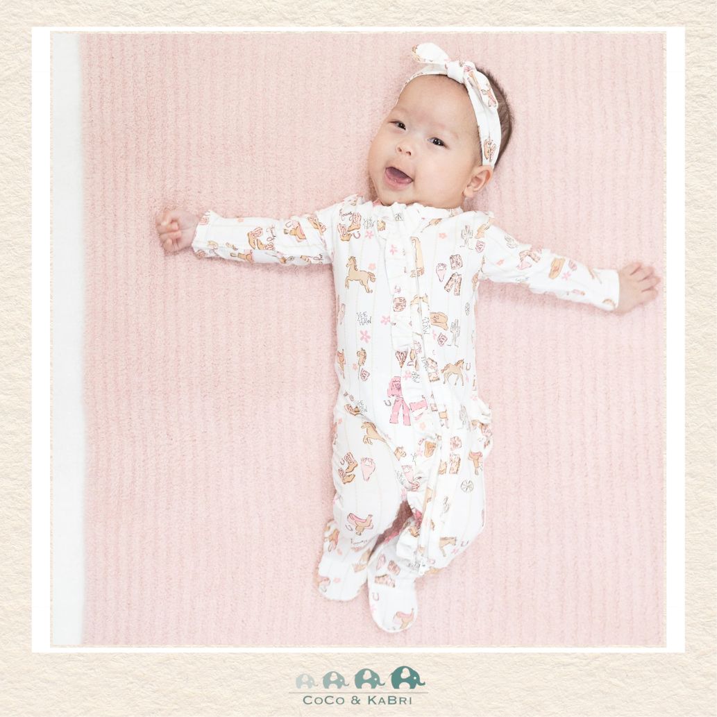 Infant wearing the Cowgirl Nursery Ruffle Front footie showing the soft bamboo fit and playful boutique charm | Canada