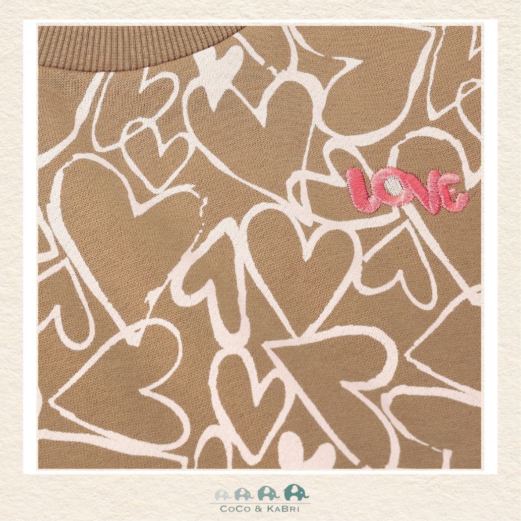 Close-up detail of the Daily7 Sweatshirt highlighting the soft-touch fabric and the intricate texture of the heart embroidery