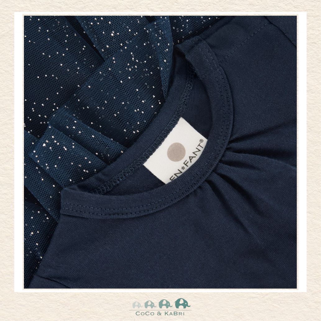 Close-up detail of the En Fant Dress highlighting the fine mesh texture of the tulle and the premium, soft lining designed for infant comfort