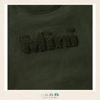 Close-up detail of the En Fant Sweatshirt highlighting the delicate "Mini" embroidery and the plush, premium texture of the sage green fabric