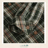 Close-up detail of the En Fant Button Down highlighting the rich forest green and neutral plaid weave, high-quality buttons, and precise stitching