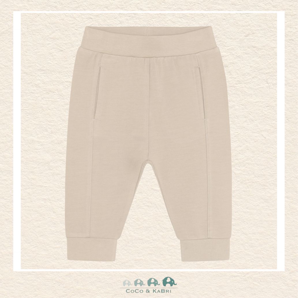 Front view of the Fixoni Baby Beige Pants featuring a soft elasticated waistband and a clean, minimalist silhouette in a versatile neutral tone