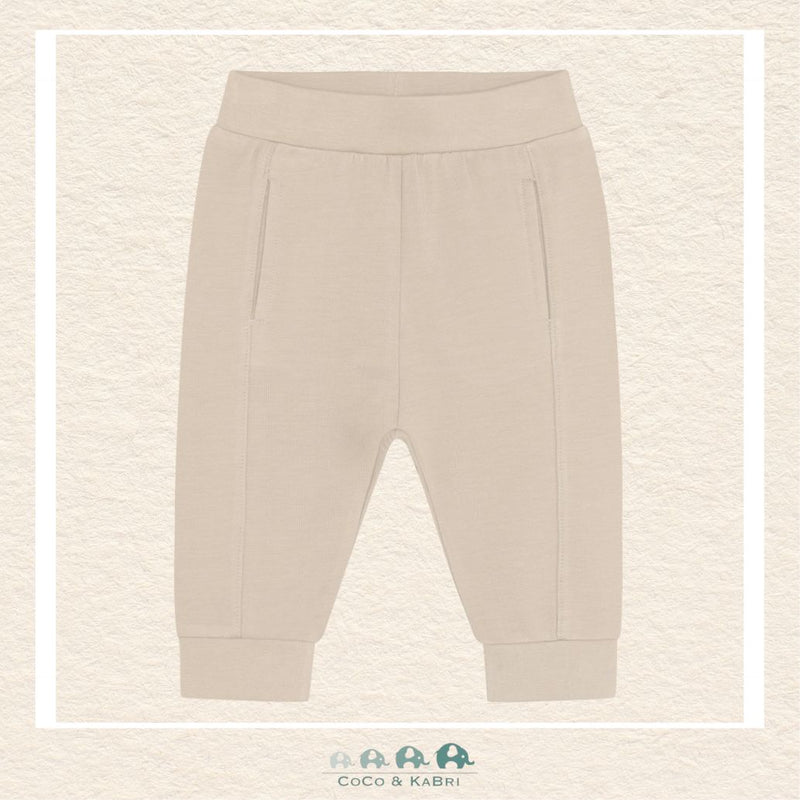 Front view of the Fixoni Baby Beige Pants featuring a soft elasticated waistband and a clean, minimalist silhouette in a versatile neutral tone