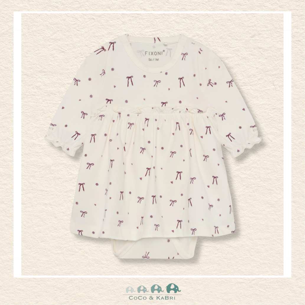 Front view of the Fixoni Baby Girl Body Dress in Nostalgia Rose featuring a delicate bow print and a sweet integrated skirt silhouette