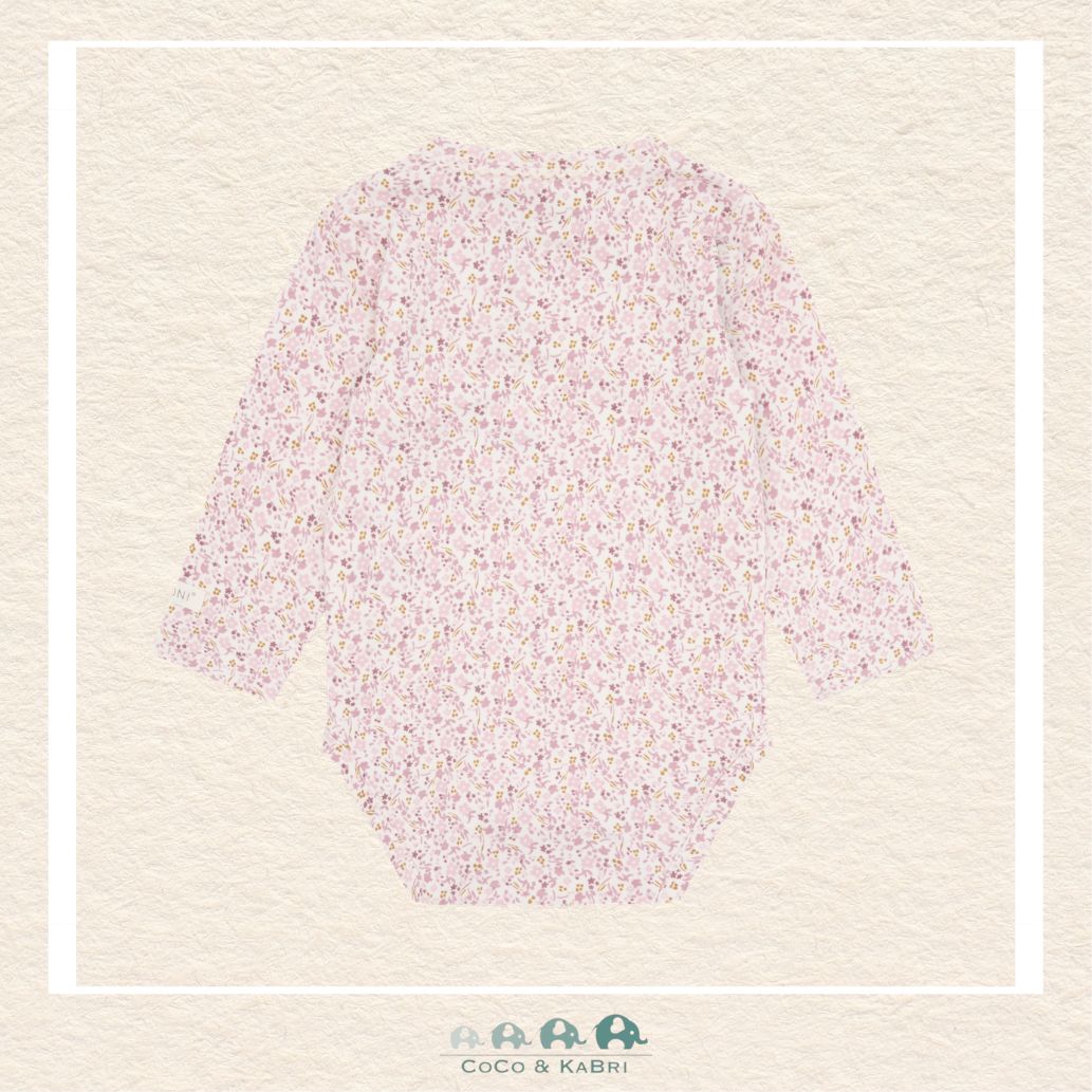 Back view of the pale lilac Fixoni diaper shirt showing the smooth, seamless construction and the premium finish of the long sleeves