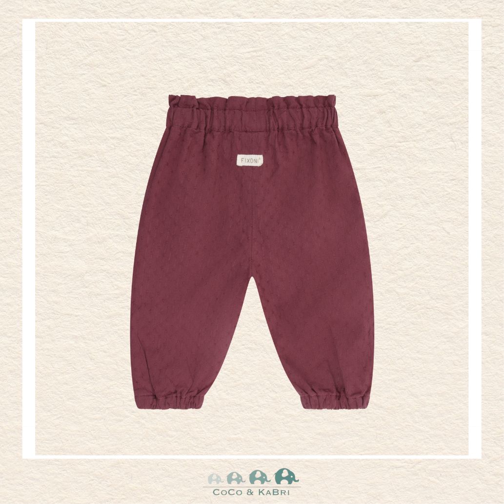 Back view of the Crushed Berry woven pants showing the premium fabric finish and the relaxed fit designed for ease of movement