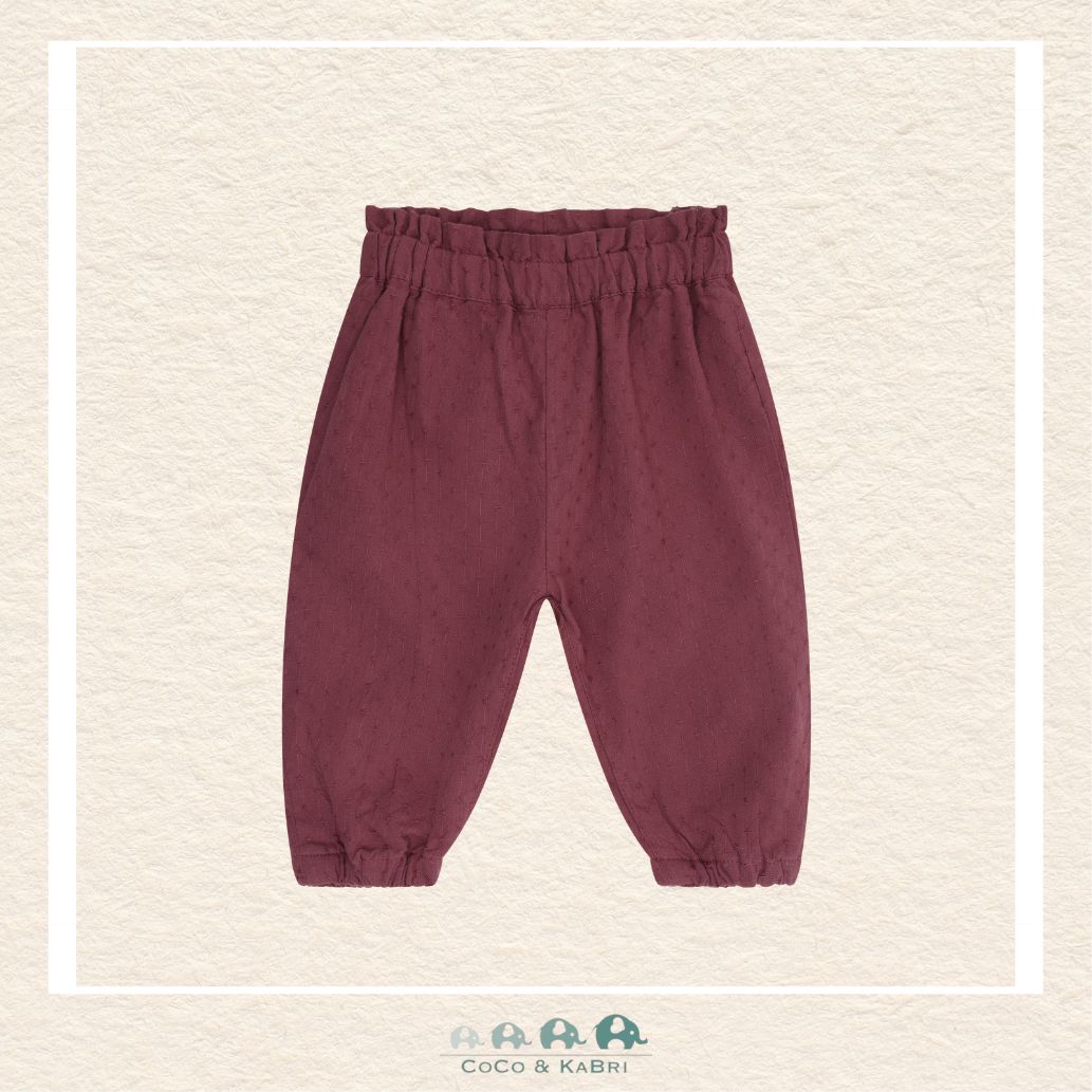 Front view of the Fixoni baby girl woven pants in Crushed Berry featuring a comfortable elastic waistband and a sophisticated, slightly structured silhouette