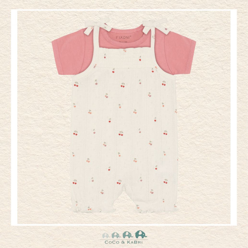 Front view of the Fixoni Two-Piece Set featuring soft coral short-sleeve t-shirt layered under white overalls with a sweet cherry print