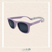 Purple sunglasses with dark lenses on a light beige background