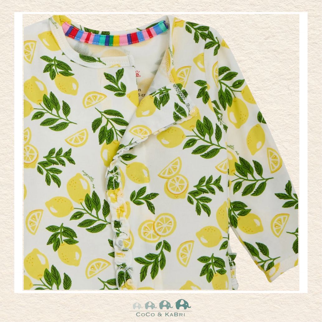 Close-up of Magnetic Me Simply the Zest ruffle footie highlighting the hidden magnetic fastener technology and the vibrant citrus boutique design | Canada