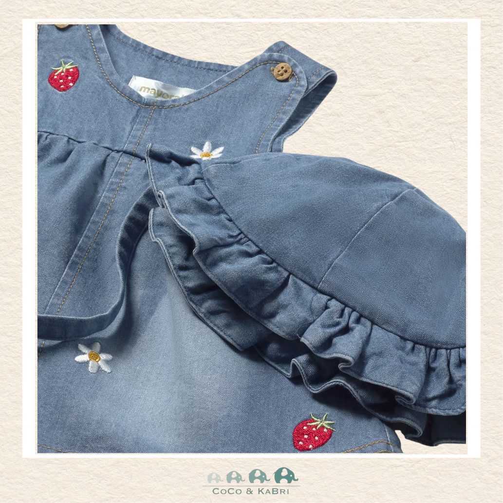 Close-up of Mayoral denim fabric showing the detailed strawberry and daisy patterns and soft cotton-rich texture | Canada
