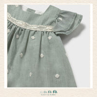 Close-up of Mayoral dress fabric showing the intricate embroidery accents and premium textured finish | Canada