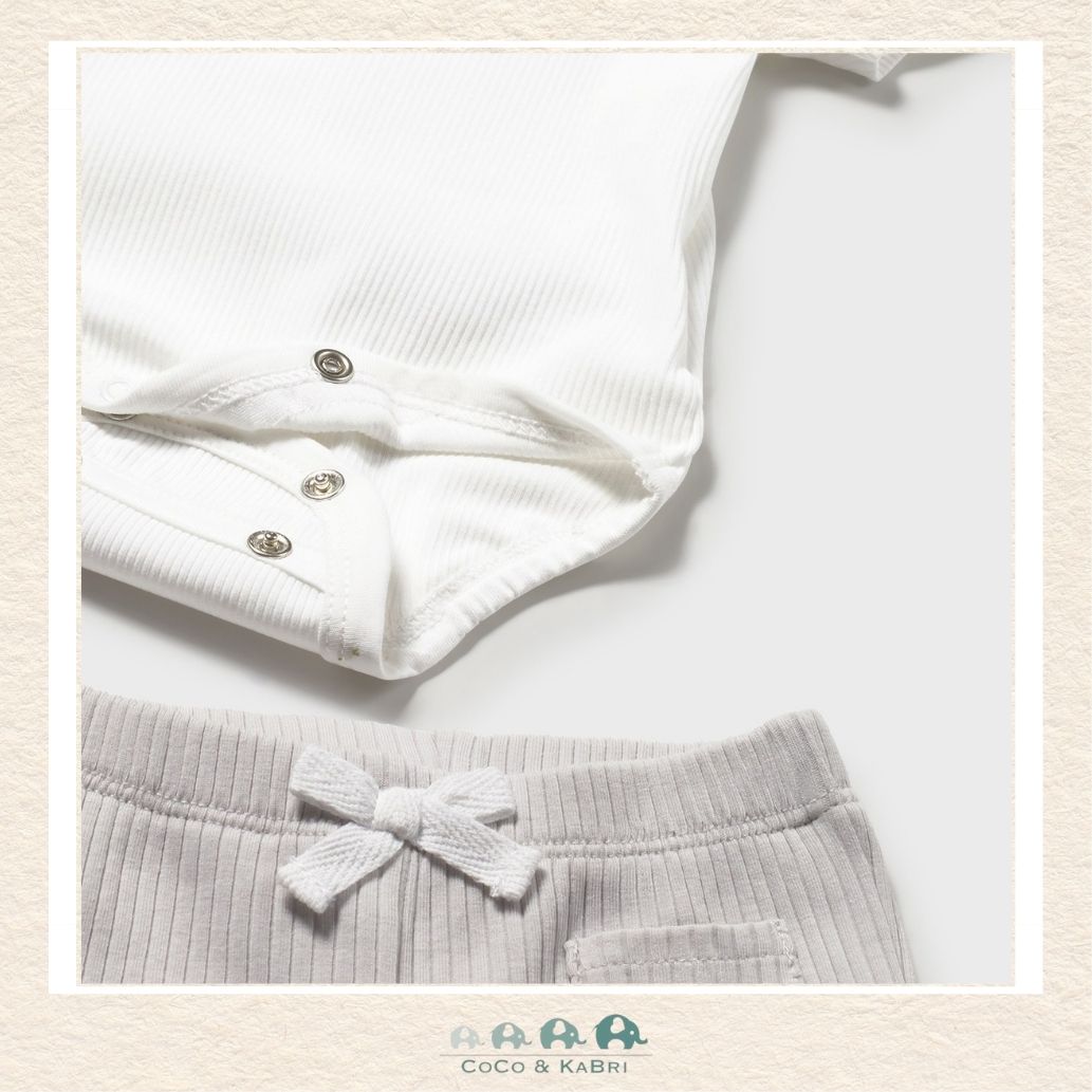 Close-up of Mayoral baby fabric showing the premium soft-touch cotton texture and sophisticated unisex design | Canada