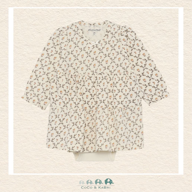Front view of the Minymo Baby Girls Body Dress in Seedpearl Floral featuring a delicate vintage-inspired floral print, a gathered skirt, and integrated bodysuit construction