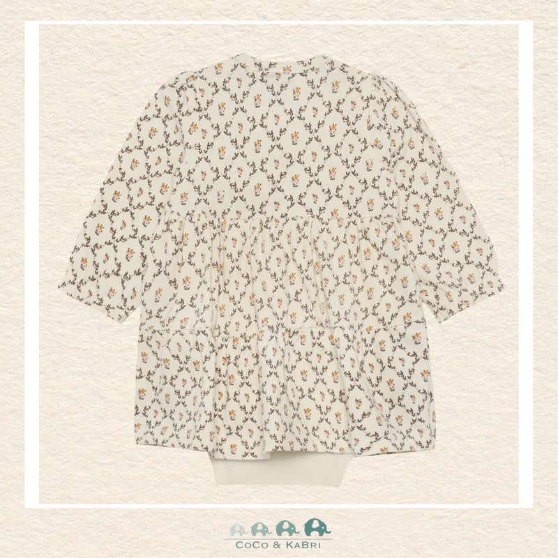 Back view of the Minymo Seedpearl Floral Dress showing the seamless long-sleeve design and the high-quality cotton-stretch knit tailored for active infants