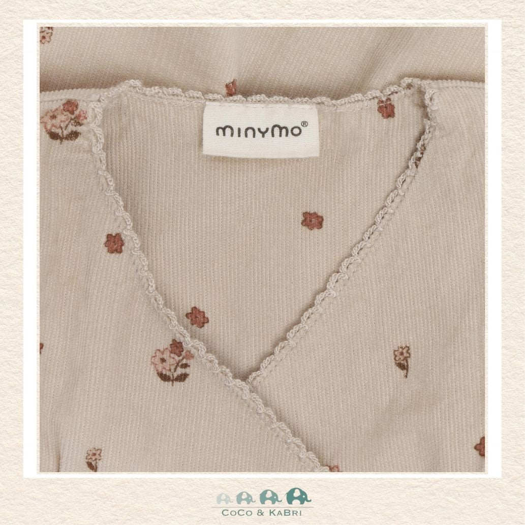 Close-up detail of the Minymo Corduroy Dress highlighting the fine-wale cotton ribs, precise stitching on the ruffles, and the sophisticated light gray hue