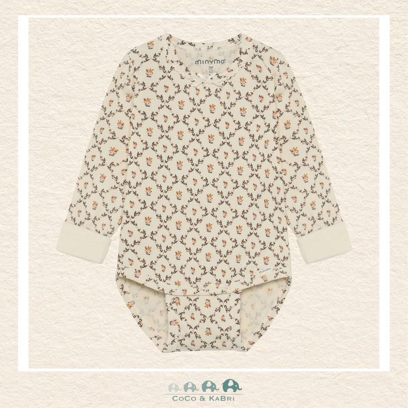 Front view of the Minymo Baby Girl Diaper Shirt in Seedpearl featuring a delicate all-over floral print and convenient snap closures at the shoulder and bottom
