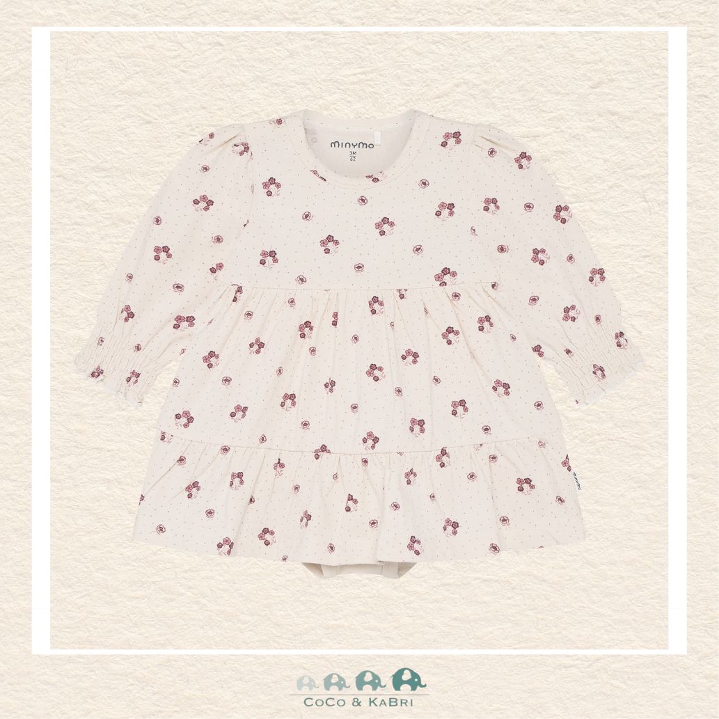 Front view of the Minymo Baby Girl Floral Dress featuring a whimsical all-over botanical print and a soft, flowing silhouette perfect for spring