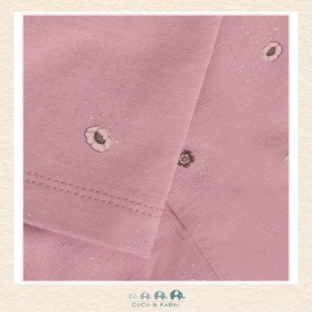 Detailed close-up of the Minymo floral print highlighting the soft viscose-cotton blend texture and the intricate petal and leaf patterns