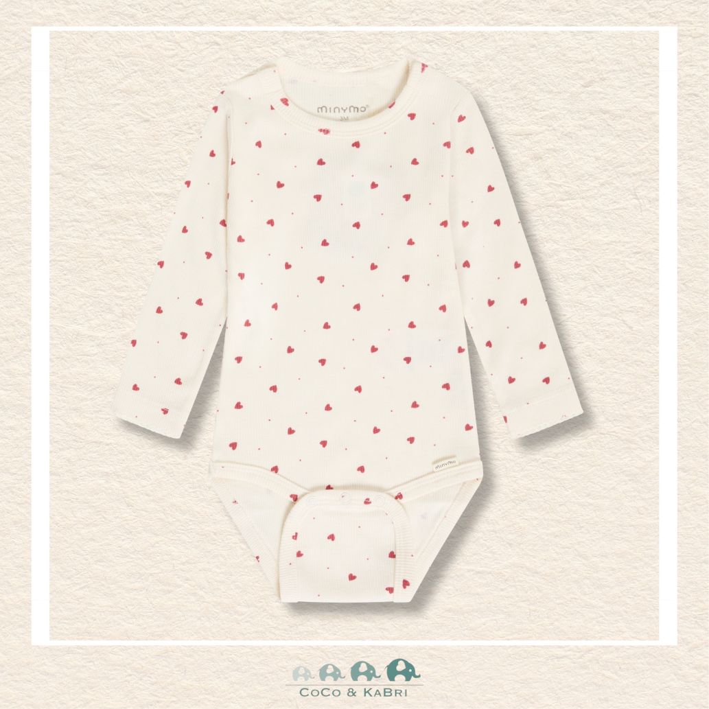 Front view of the Minymo Baby Girl Heart Diaper Shirt featuring a sweet all-over heart print and a comfortable envelope-style neckline