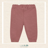Close-up detail of the Minymo Baby Sweatpants highlighting the muted Burlwood hue and the soft, brushed interior of the premium cotton-stretch knit fabric