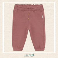 Front view of the Minymo Baby Girls Sweatpants in Burlwood featuring a sophisticated dusty rose-mauve tone, a wide soft-elastic waistband, and ribbed ankle cuffs