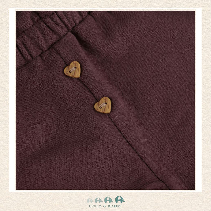 Close-up detail of the Minymo Baby Sweatpants highlighting the rich Huckleberry color and the soft-touch texture of the premium cotton-stretch performance knit