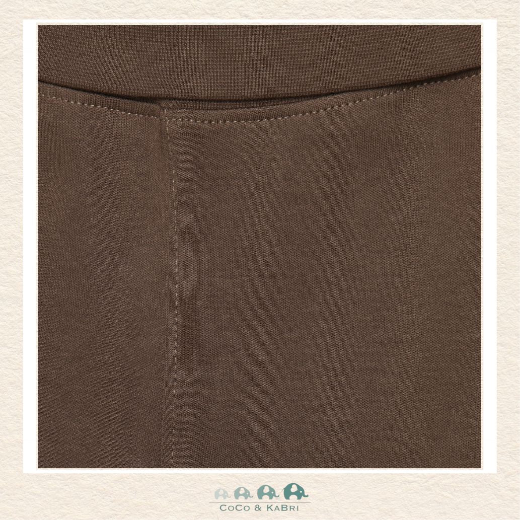 Close-up detail of the Minymo Sweatpants highlighting the rich earthy brown color and the soft, breathable texture of the premium 100% cotton-knit fabric