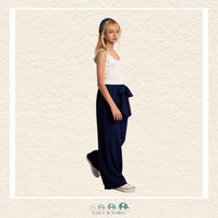 Front view of a girl wearing the Molly Bracken Navy Flowing Pants, showcasing the sophisticated wide-leg silhouette and the comfortable, high-waisted fit