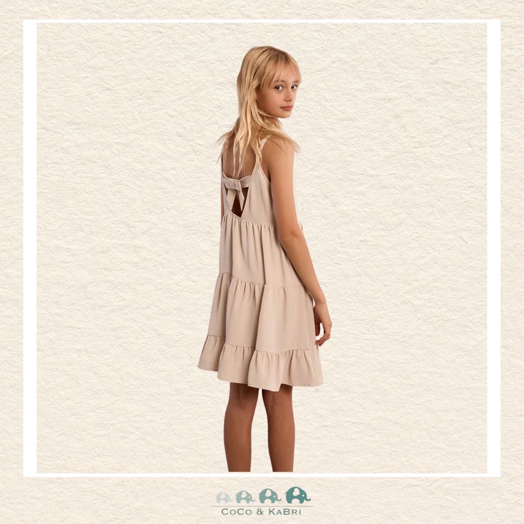 Back view of the model wearing the Molly Bracken dress, demonstrating the breezy A-line silhouette and the romantic, bohemian movement of the skirt