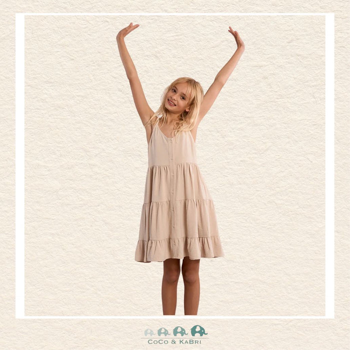 Front view of a girl wearing the Molly Bracken Cream Ruffled Dress, showcasing the flattering V-neckline and the elegant drape of the full-length button-down front