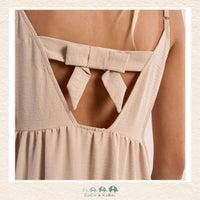 Back view of the model wearing the Molly Bracken dress, demonstrating the breezy A-line silhouette and the romantic, bohemian movement of the skirt